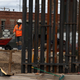 US workers build the border wall between El Paso, Texas, US and Ciudad Juarez, Mexico on February 5, 2019.